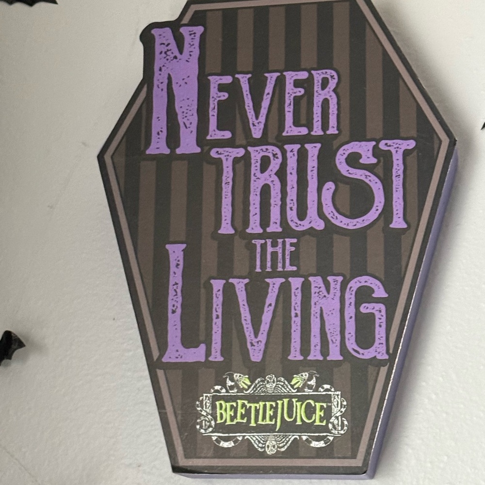 Beetlejuice Never Trust The Living wood sign